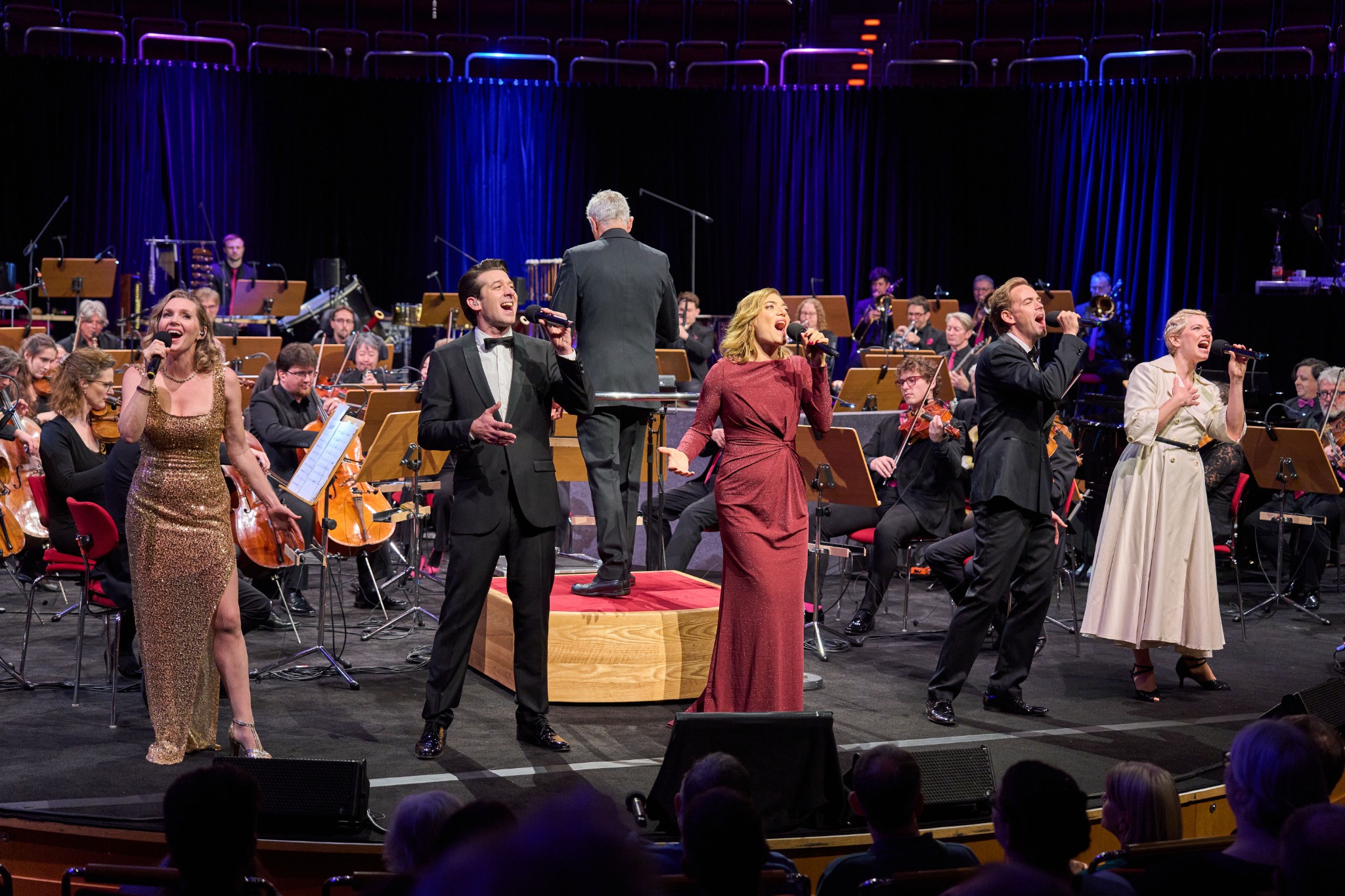 The company of Defying Gravity performing with the WDR Funkhausorchester in Cologne.
